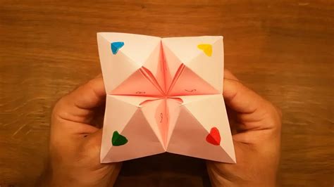 To make the fortune teller: 1. Get a square piece of paper. 2. Fold the paper in half (corner to corner) so that it becomes a triangle. 3. Fold the paper in half again …